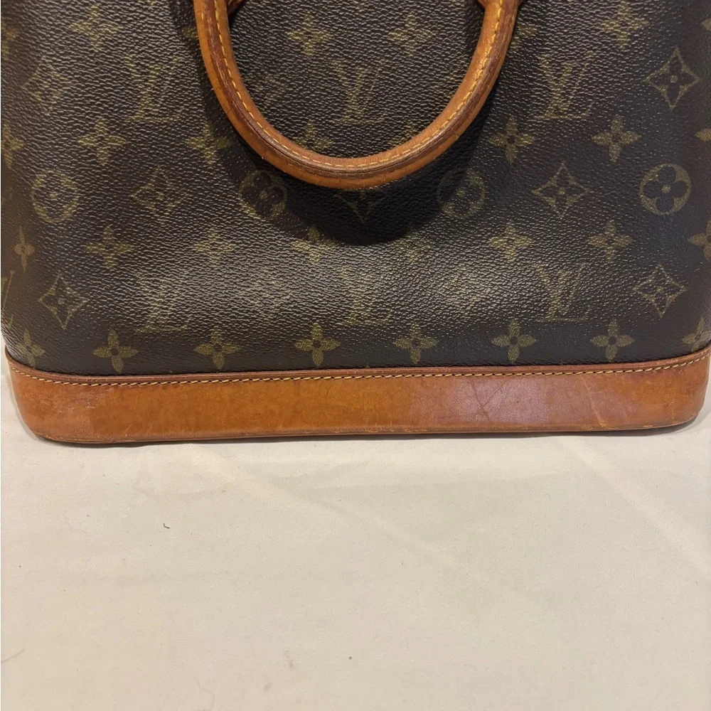 Louis Vuitton Alma Monogram Coated Canvas Handbag - Picture 5 of 16